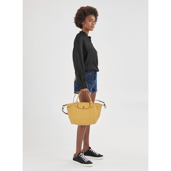 Longchamp - Le Pliage Cuir Bolsa de Mão Feminina em Pele Bege - Rolling  Luggage | Malas & Acessórios